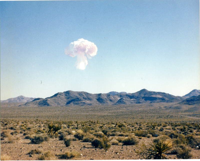 “This photo view of the emerging mushroom cloud explosion, rising from behind the mountain comes from the nuclear museum in Albuquerque. I think the photo was taken near the Nellis Air Force Base or some village in the state of Nevada. The photo was not identified by the museum, I myself determined that it was an Encore explosion, 27 kilotons, in 1953.” -Alexander Mikhalchenko
